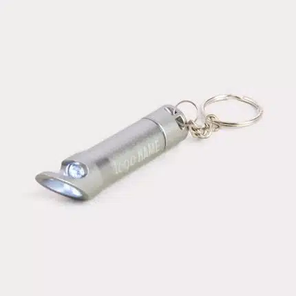 Porte-clés avec lampe et ouvre-bouteille